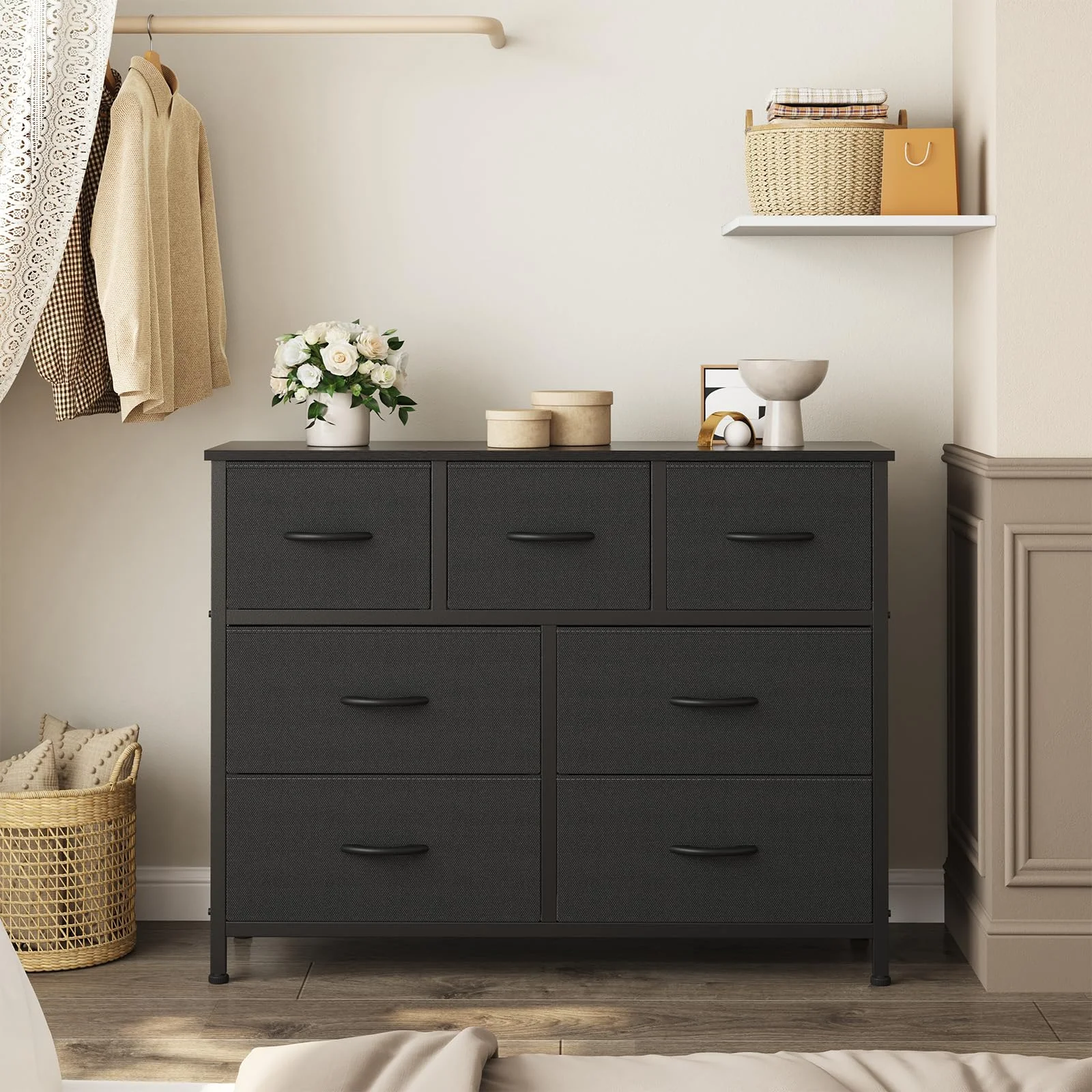 A OLIXIS fabric dresser standing assembled in a small daylight bedroom